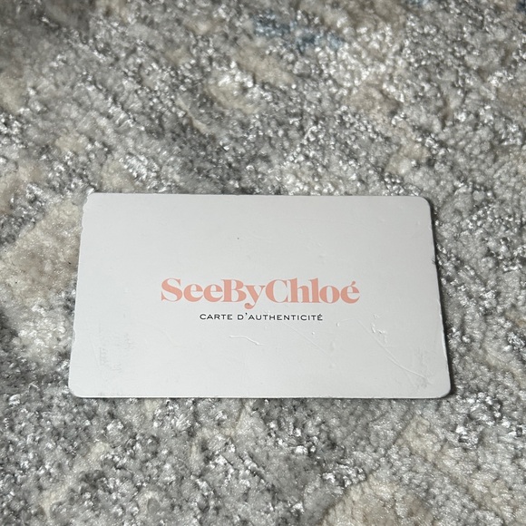 304. See By Chloe Black Leather & suede with removable Gold Charm w/coa - Picture 13 of 16